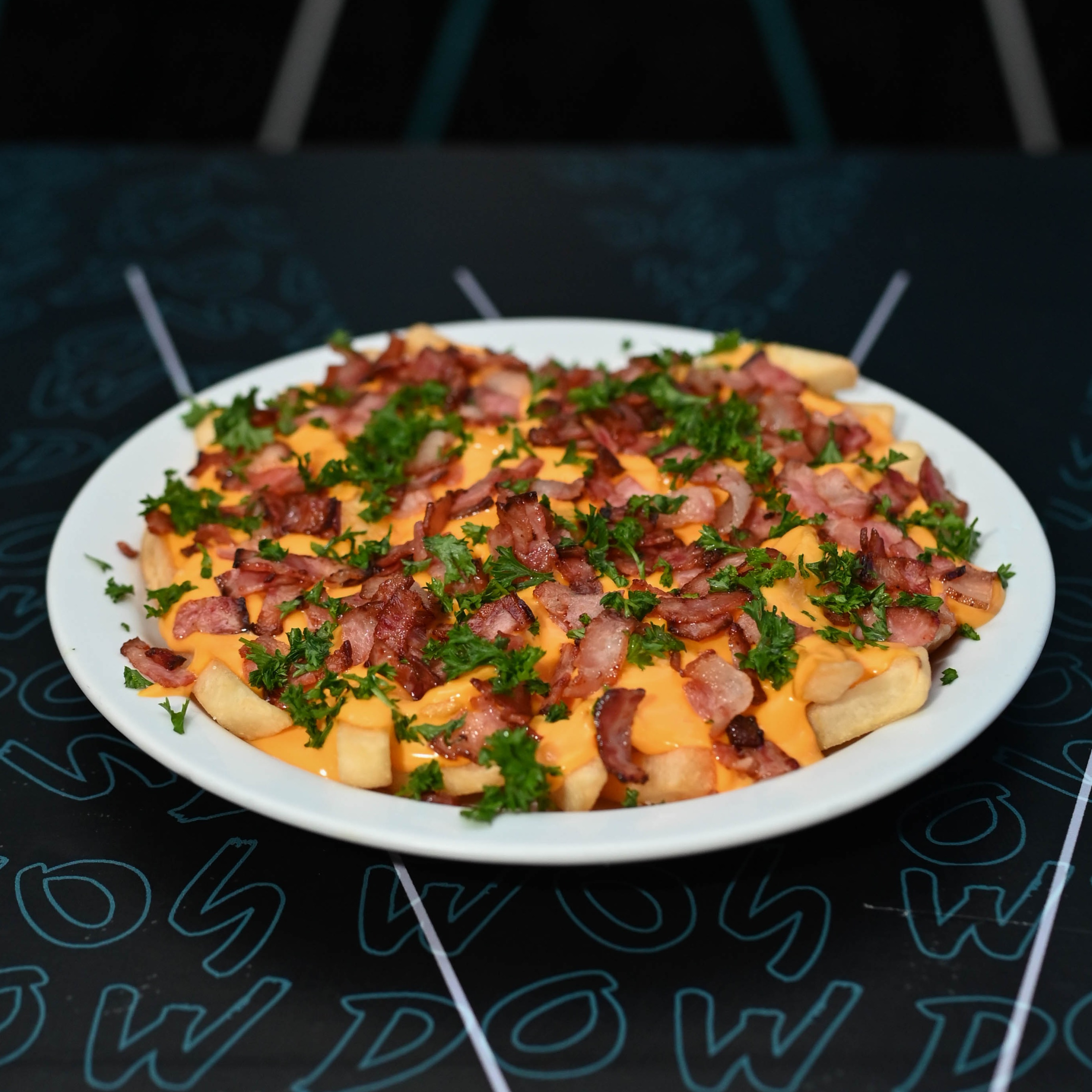 Papas campesinas con Cheddar y Bacon - acompañante de Woods Lounge Bar